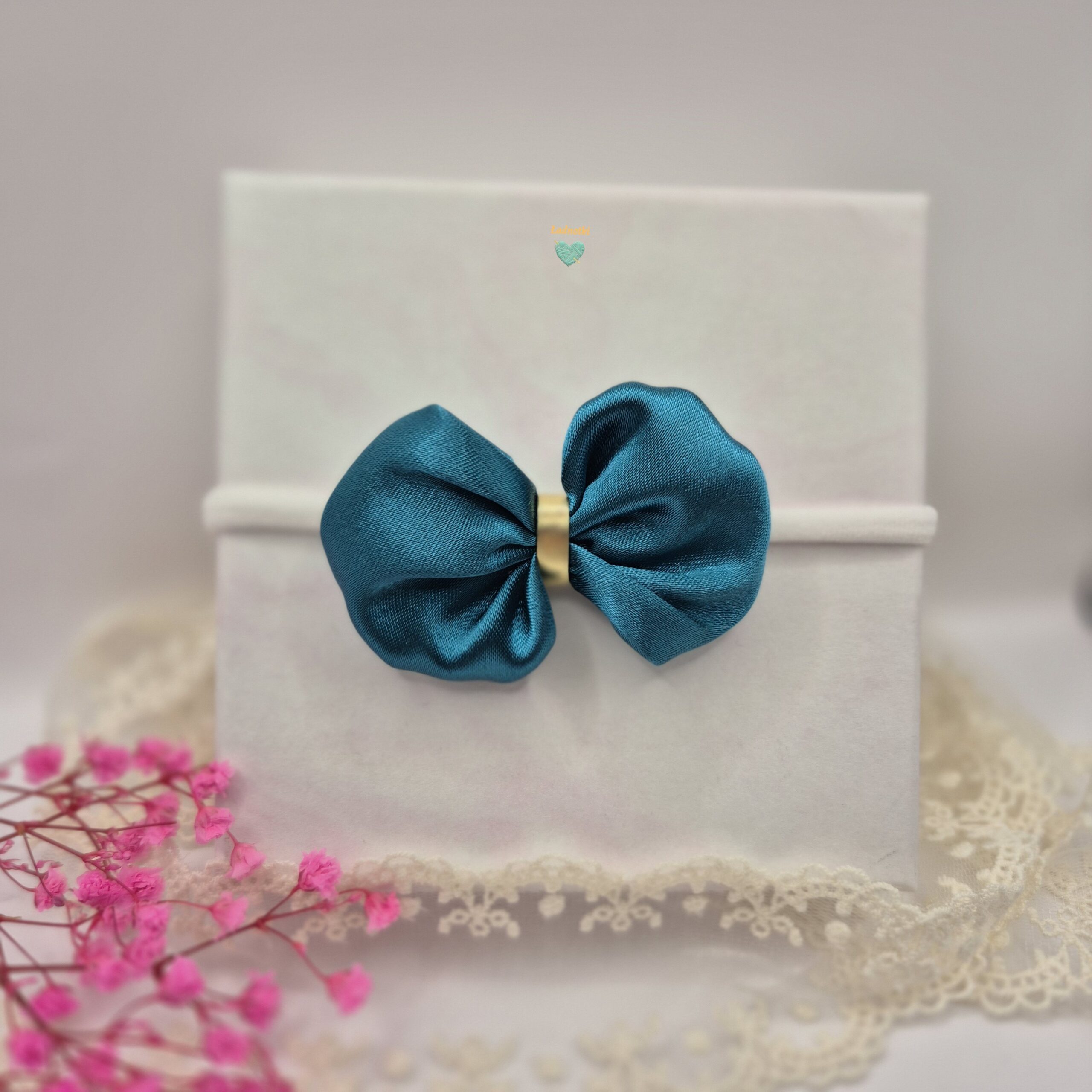 Opaska bezuciskowa z kokardą- morska satyna